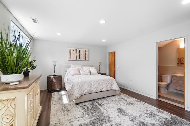bedroom with ensuite bathroom, baseboards, dark wood-type flooring, visible vents, and recessed lighting
