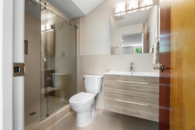 bathroom with a shower stall, tile patterned flooring, visible vents, toilet, and vanity