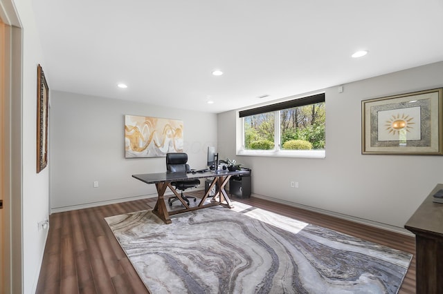 home office featuring baseboards, wood finished floors, and recessed lighting