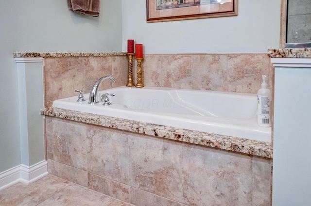 3995 Kensingwood Dr, Columbus, OH 43230 - full bathroom featuring a garden tub and tile patterned floors