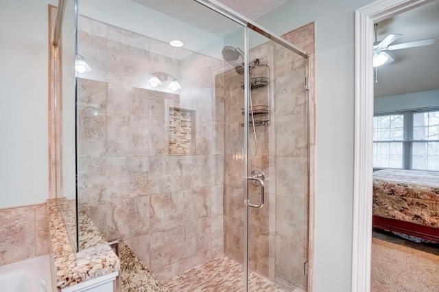 3995 Kensingwood Dr, Columbus, OH 43230 - bathroom featuring a stall shower, ceiling fan, and ensuite bathroom