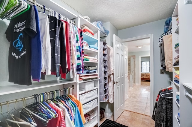 3995 Kensingwood Dr, Columbus, OH 43230 - walk in closet with tile patterned floors
