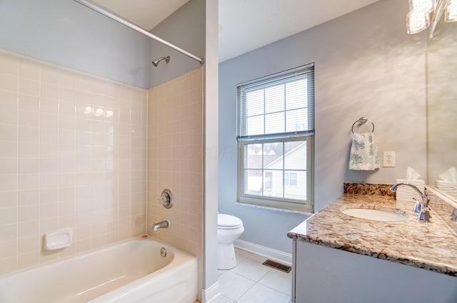 3995 Kensingwood Dr, Columbus, OH 43230 - bathroom with vanity, toilet, baseboards, tile patterned floors, and tub / shower combination