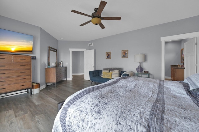 bedroom featuring a ceiling fan, baseboards, dark wood-style flooring, and visible vents