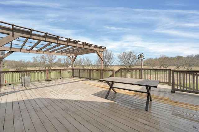 wooden terrace with a pergola