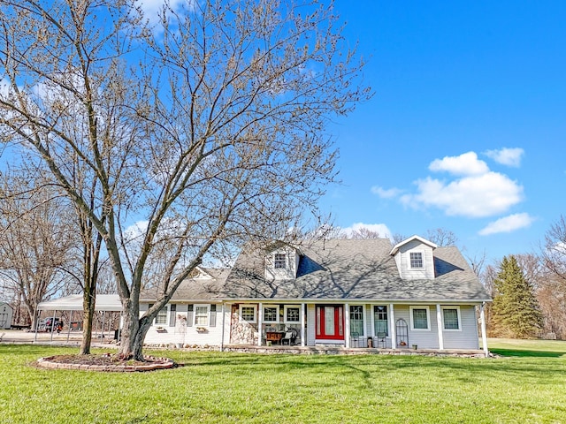 2837 State Route 529, Cardington, OH 43315 - cape cod house featuring a front lawn, roof with shingles, a carport, and covered porch