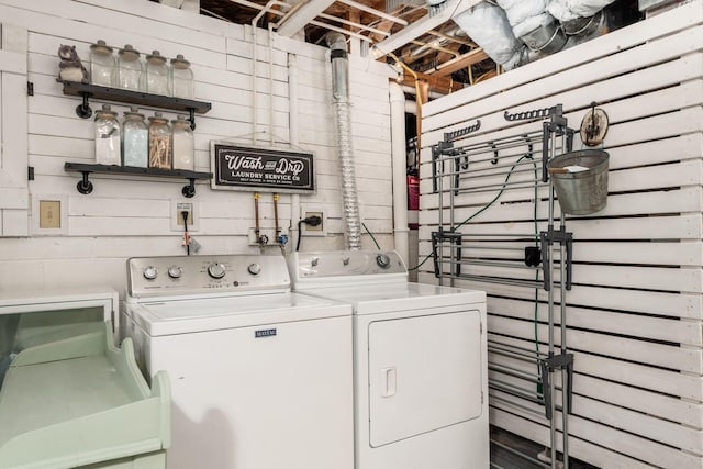 washroom with washer and dryer and laundry area