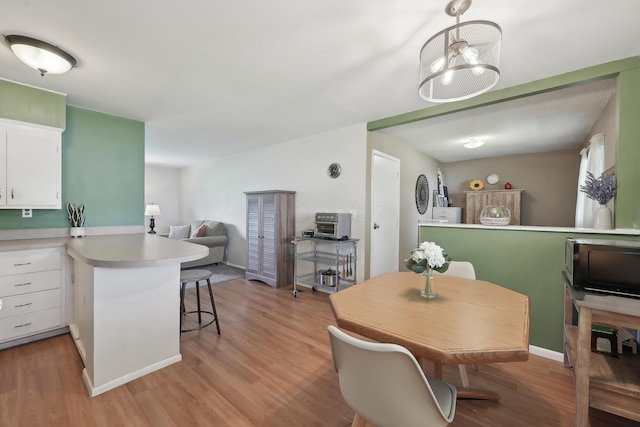 dining room featuring light wood-type flooring