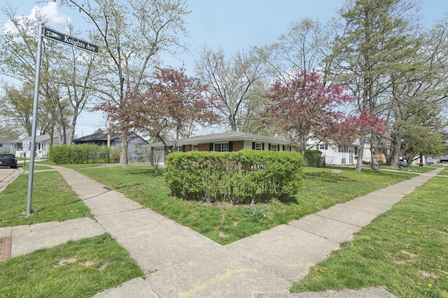 surrounding community with a lawn