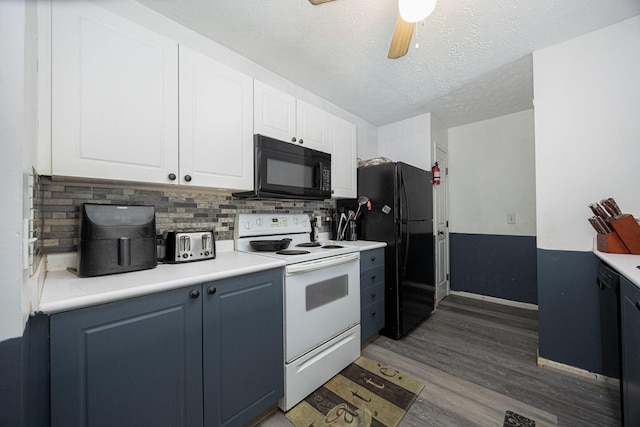 4859 Brice Pond Dr Unit 19B, Canal Winchester, OH 43110 - kitchen featuring a ceiling fan, wood finished floors, white cabinetry, and black appliances