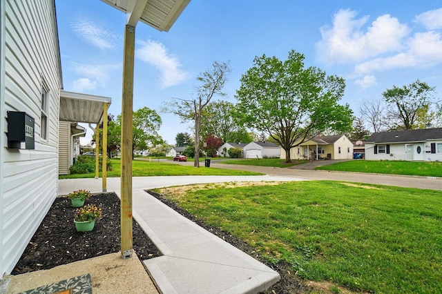 view of yard with a residential view