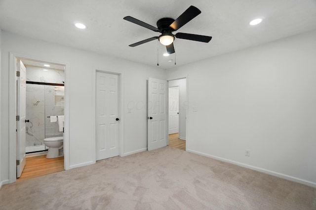 unfurnished bedroom featuring carpet floors, baseboards, ensuite bathroom, recessed lighting, and a ceiling fan