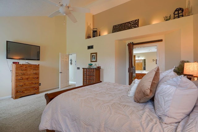 carpeted bedroom featuring a towering ceiling, visible vents, baseboards, and ceiling fan