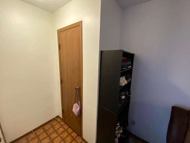 corridor with baseboards