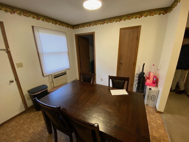 dining room with cooling unit and tile patterned floors