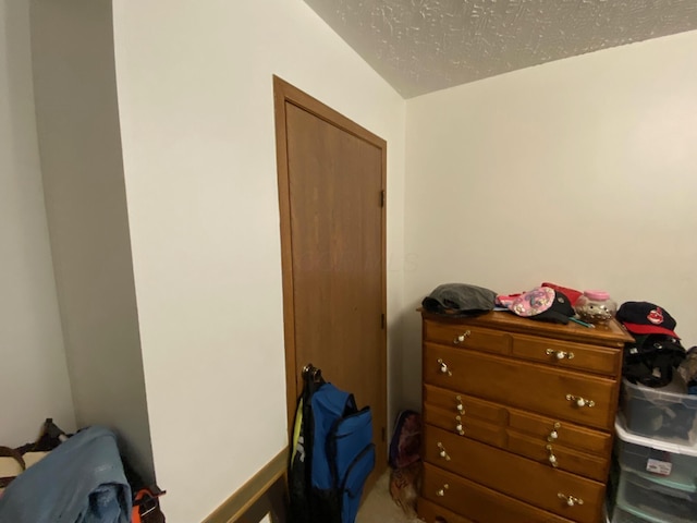 bedroom featuring a textured ceiling