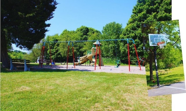 community play area with a lawn