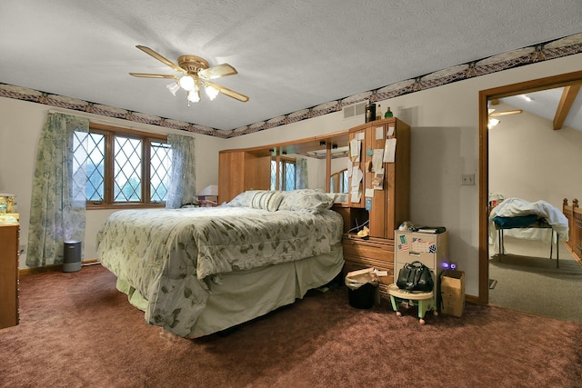 2520 Mccutcheon Rd, Columbus, OH 43219 - carpeted bedroom featuring a textured ceiling, baseboards, visible vents, and ceiling fan