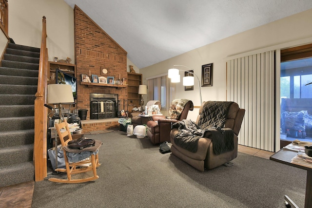 2520 Mccutcheon Rd, Columbus, OH 43219 - living area featuring carpet floors, stairs, lofted ceiling, and a fireplace