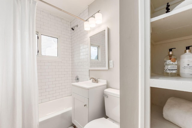 bathroom featuring toilet, shower / bath combination with curtain, and vanity