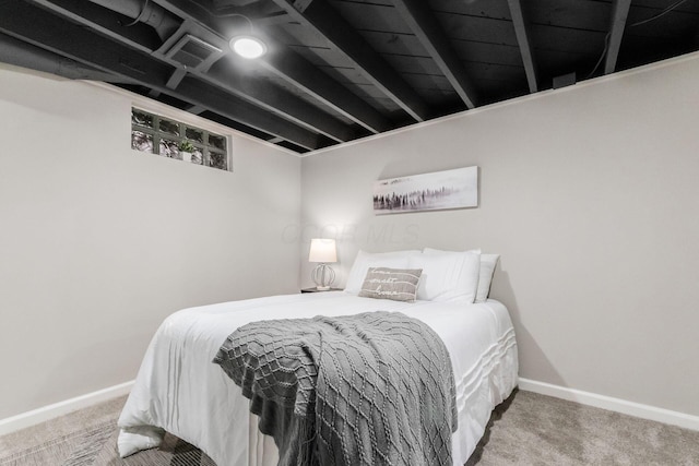 bedroom with baseboards, visible vents, and carpet floors