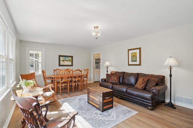 105 Chapin Pl, Granville, OH 43023 - living room with visible vents, light wood-style flooring, and baseboards