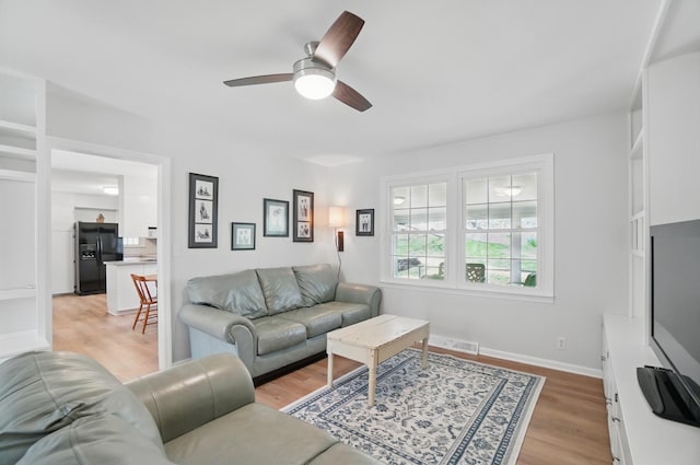 105 Chapin Pl, Granville, OH 43023 - living room with light wood-type flooring, baseboards, a ceiling fan, and visible vents