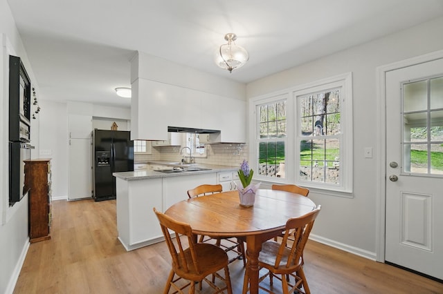 105 Chapin Pl, Granville, OH 43023 - dining room featuring light wood-style flooring and baseboards