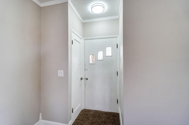 153 N High St, Mount Victory, OH 43340 - doorway featuring baseboards, crown molding, and carpet flooring