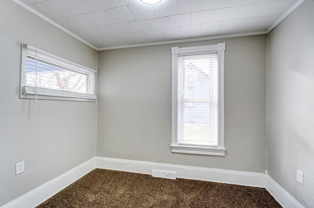 153 N High St, Mount Victory, OH 43340 - spare room with baseboards, a wealth of natural light, visible vents, and carpet