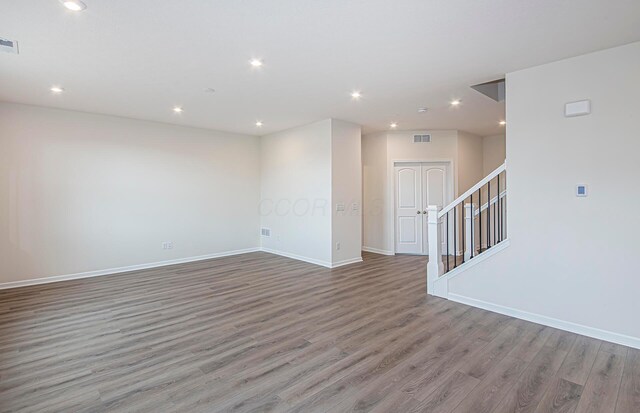 5537 Violet St Lot 367, South Bloomfield, OH 43103 - spare room with wood finished floors, stairs, and recessed lighting