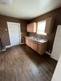 371 Hensel Ave, Springfield, OH 45505 - kitchen with dark wood-type flooring, baseboards, and a sink