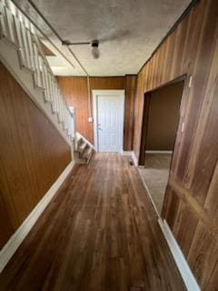 371 Hensel Ave, Springfield, OH 45505 - hall with stairs, wooden walls, wood finished floors, and baseboards