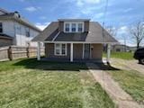 371 Hensel Ave, Springfield, OH 45505 - bungalow-style house with fence and a front lawn