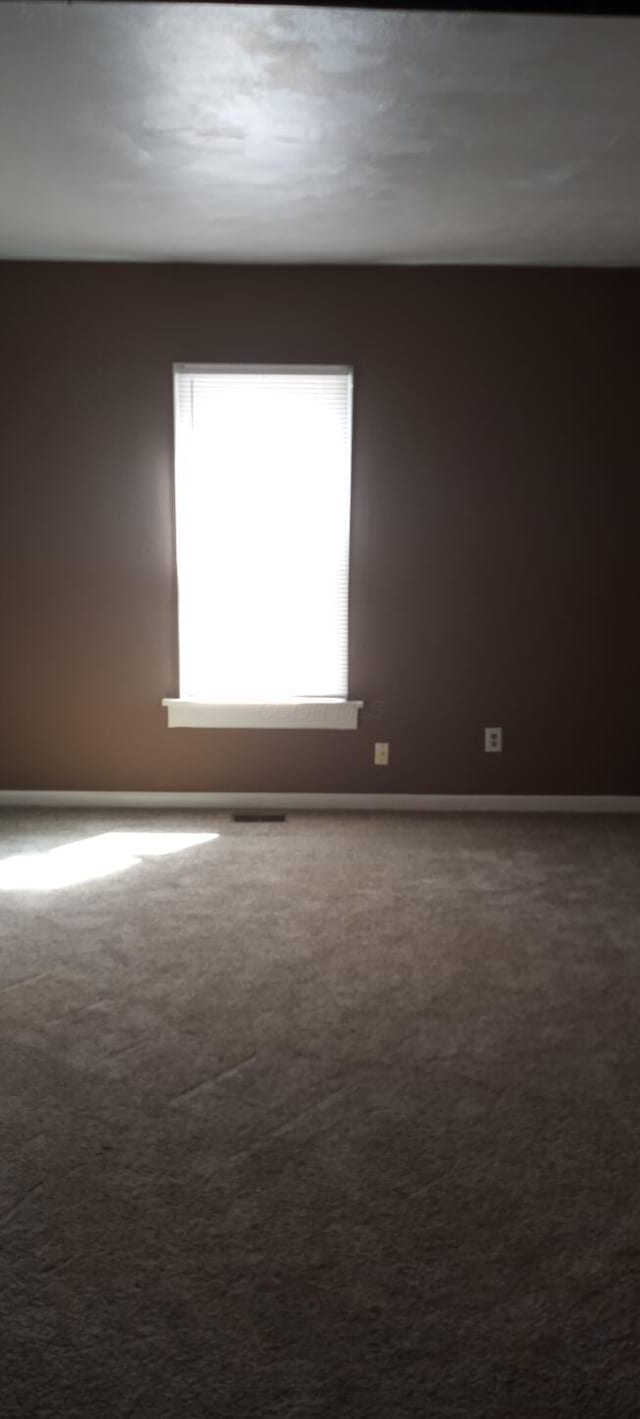 371 Hensel Ave, Springfield, OH 45505 - carpeted spare room with baseboards
