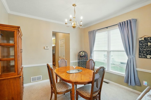 carpeted dining room featuring a wealth of natural light, a notable chandelier, baseboards, and visible vents