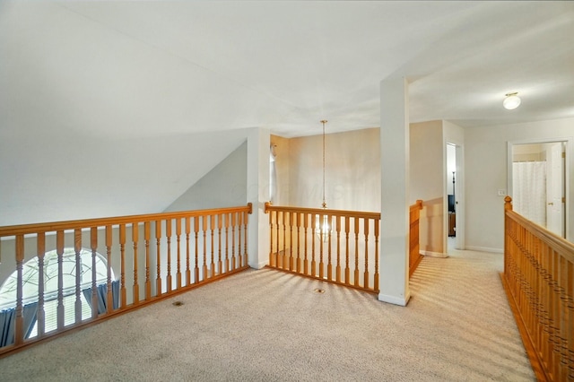 additional living space with carpet floors and baseboards