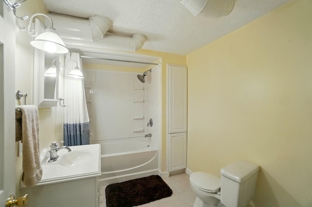 full bathroom featuring tile patterned flooring, vanity, toilet, a textured ceiling, and shower / bath combo