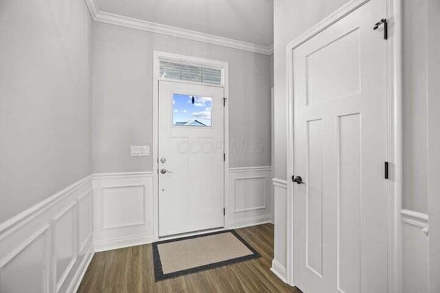 6003 Honey Farm Way, Grove City, OH 43123 - foyer featuring a decorative wall, ornamental molding, dark wood-type flooring, and wainscoting
