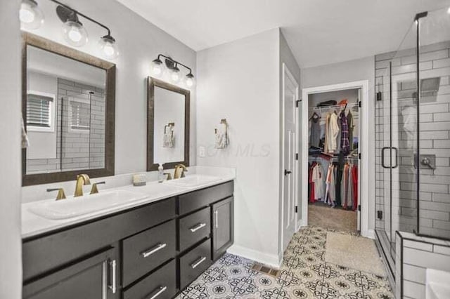 6003 Honey Farm Way, Grove City, OH 43123 - full bath with a stall shower, double vanity, a walk in closet, and a sink