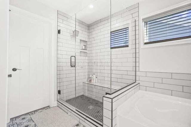 6003 Honey Farm Way, Grove City, OH 43123 - bathroom featuring tile patterned floors, a garden tub, and a shower stall