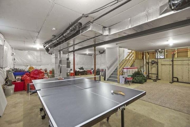 6003 Honey Farm Way, Grove City, OH 43123 - playroom with concrete flooring and brick wall