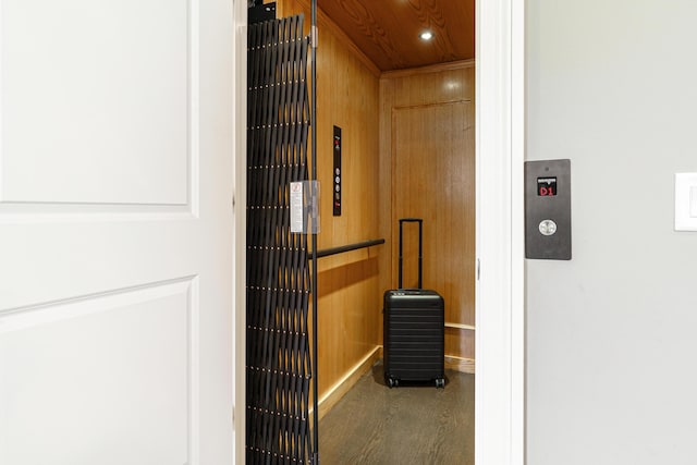 251 E Deshler Ave, Columbus, OH 43206 - interior details featuring elevator, wooden walls, and recessed lighting