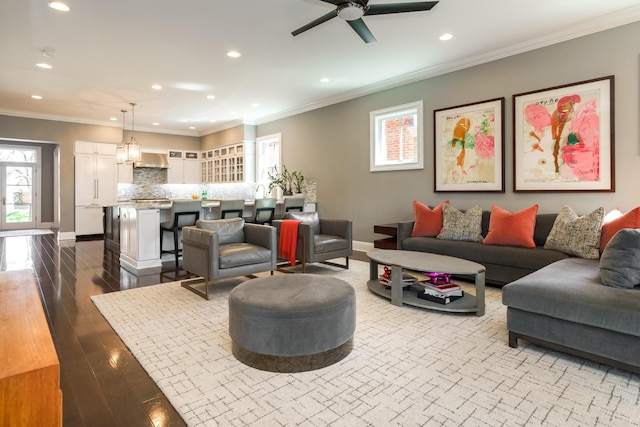 251 E Deshler Ave, Columbus, OH 43206 - living area with recessed lighting, ceiling fan, crown molding, baseboards, and dark wood-style flooring