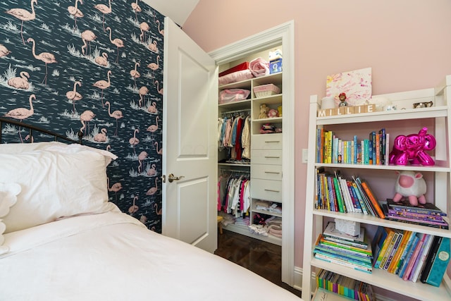 251 E Deshler Ave, Columbus, OH 43206 - bedroom featuring wood finished floors and a closet