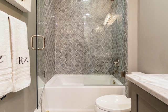 251 E Deshler Ave, Columbus, OH 43206 - full bathroom with bathing tub / shower combination, vanity, and toilet
