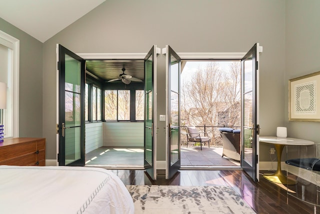 251 E Deshler Ave, Columbus, OH 43206 - bedroom featuring lofted ceiling, wood finished floors, french doors, baseboards, and access to outside
