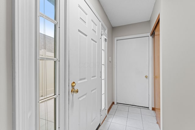 478 Three Oaks Ct, Columbus, OH 43230 - entryway featuring light tile patterned floors and baseboards