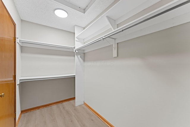 478 Three Oaks Ct, Columbus, OH 43230 - walk in closet with wood finished floors