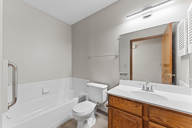 478 Three Oaks Ct, Columbus, OH 43230 - bathroom with a garden tub, toilet, vanity, and wood finished floors